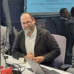 Ali K.